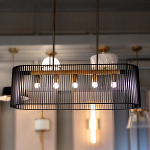 Люстра подвесная овальной формы с металлическим решетчатым абажуром матово-черного цвета и 5 лампами Kichler варинант исполнения - 7 | Loft Concept в Барнауле